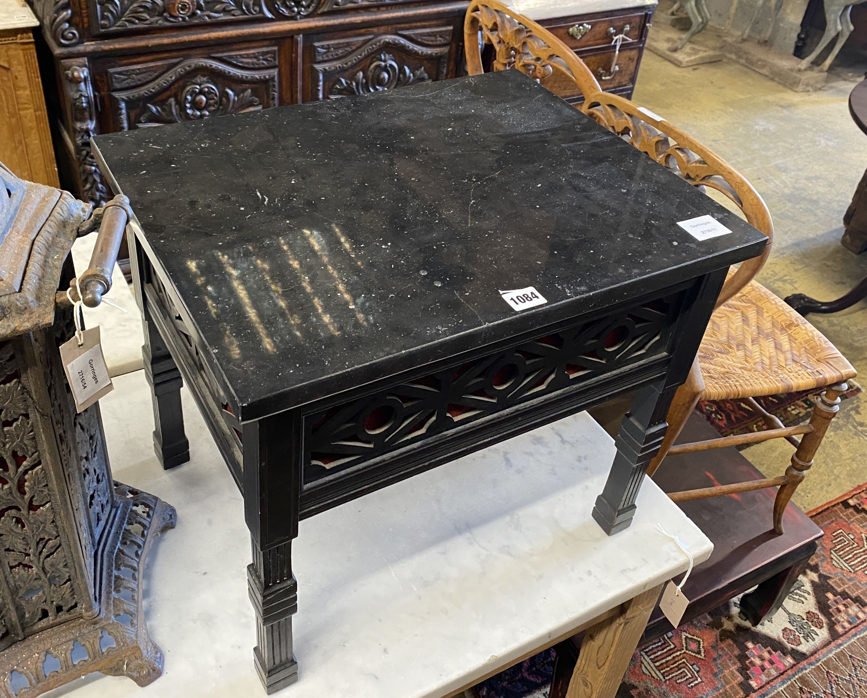 A late Victorian fret cut ebonised marble-topped occasional table, adapted, width 52cm, depth 40cm, height 45cm